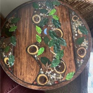 Wood and Resin Round Table with Leaf Design